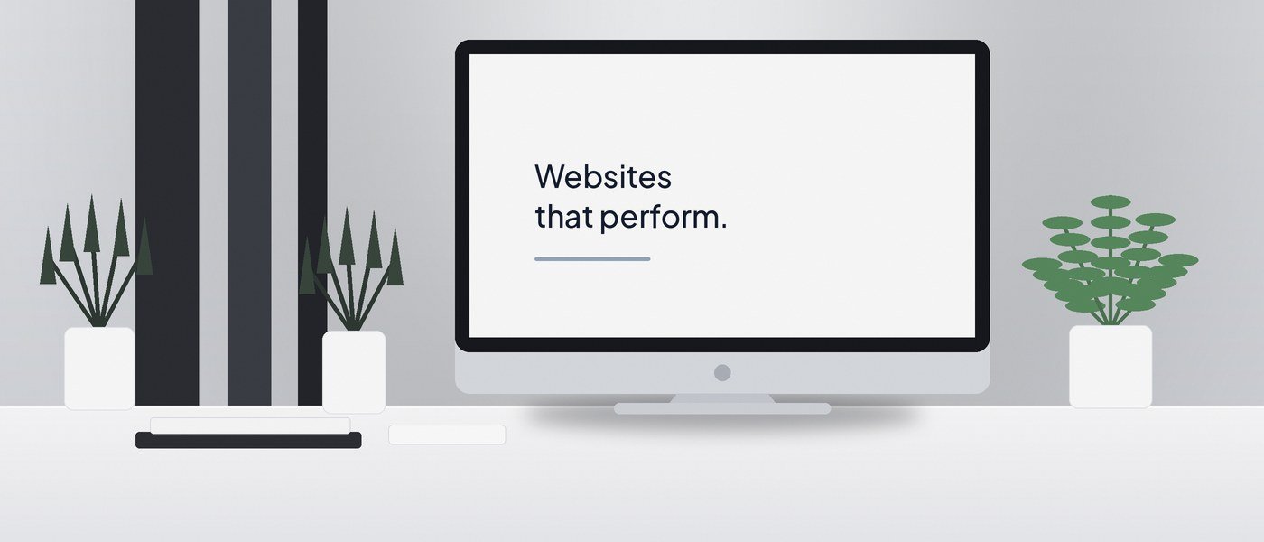 A desktop monitor on a tidy desk showing a website with the headline “Websites that perform.”