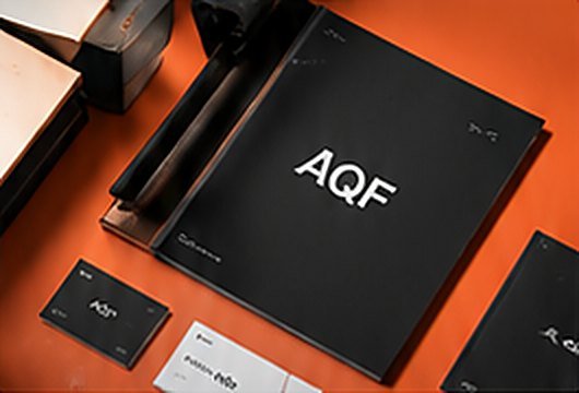AQF stationery on an orange background